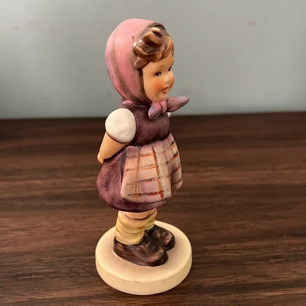 Charming Figurine with Purple and Brown Accents